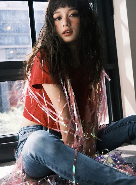 A quiet portrait beside a window